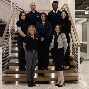 IMAGE: Texell Insurance employees group photo inside Headquarters