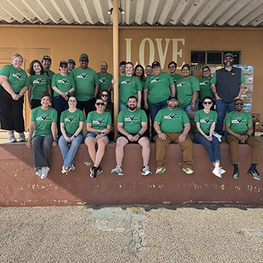 IMAGE: Texell employees volunteering at Love of Christ Food Pantry in Temple as part of a Texell Serves event